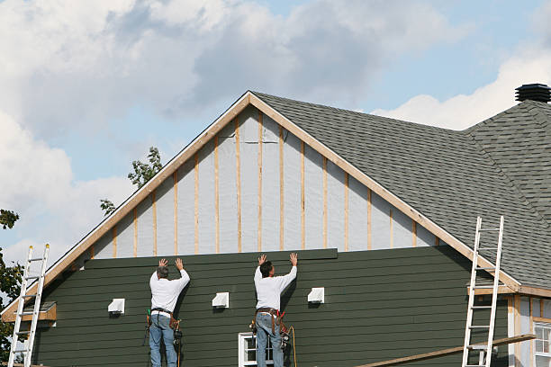 Professional Emergency Siding Repair technician working in Cumberland, IN